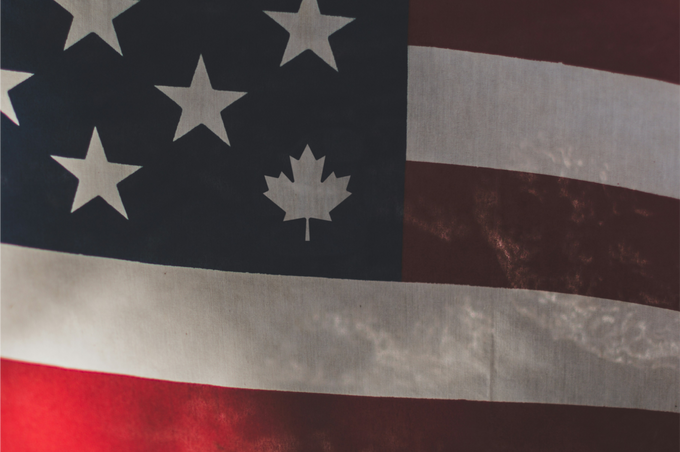 Zoomed in image of the USA flag, with one star replaced by a maple leaf